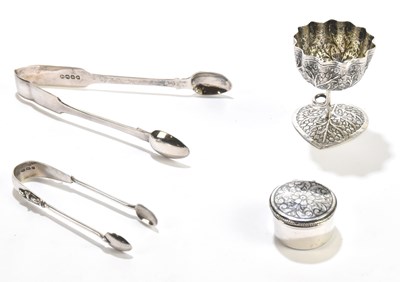 Lot 2447 - Two pairs of hallmarked silver sugar tongs,...