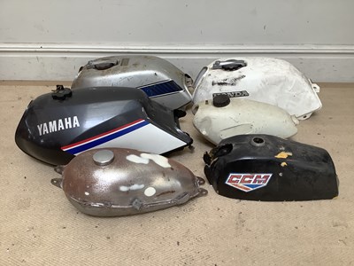 Lot 2011 - A collection of various motorcycle fuel tanks...