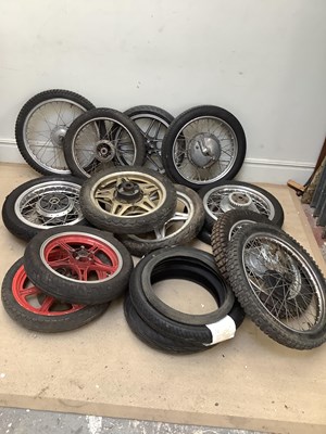 Lot 2015 - A collection of motorcycle rims, including tyres.