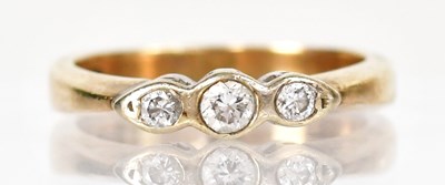 Lot 1030 - A 9ct yellow gold ring set with three diamonds...