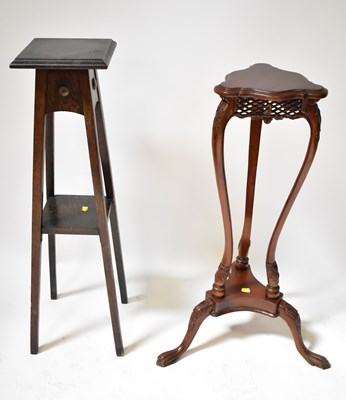 Lot 71 - A reproduction mahogany plant stand on...