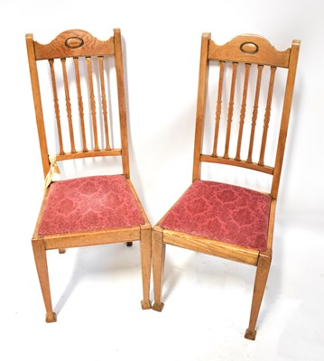 Lot 59 - Four Edwardian oak dining chairs, with drop-in...