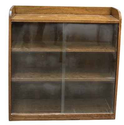 Lot 90 - An early to mid 20th century oak bookcase,...