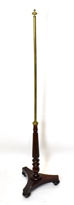 Lot 1648 - A Regency mahogany and brass pole screen