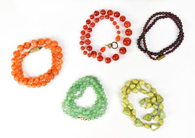Lot 1096 - Five beaded gemstone necklaces, to include two...