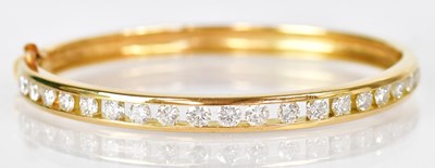 Lot 1042 - BOODLE & DUNTHORNE; an 18ct yellow gold hinged...