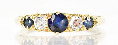 Lot 1022 - An 18ct yellow gold ring set with three...