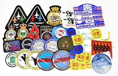 Lot 651 - Various cloth badges in association with...