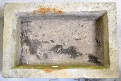 Lot 137 - A carved stone trough of rectangular form, 21...