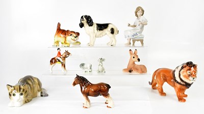 Lot 205 - Various ornamental animals including a lion,...