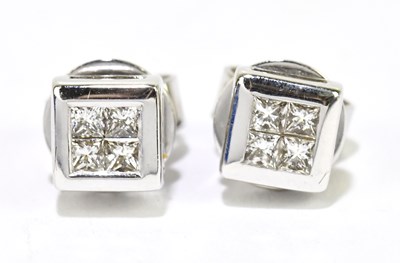 Lot 1516 - A pair of 14ct white gold diamond ear studs,...
