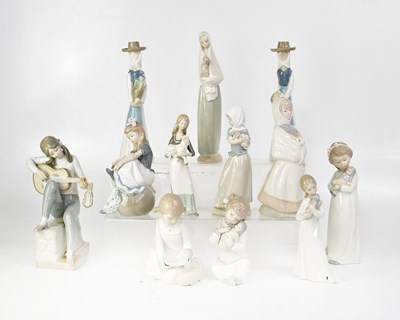 Lot 168 - Twelve Nao and similar porcelain figures of...