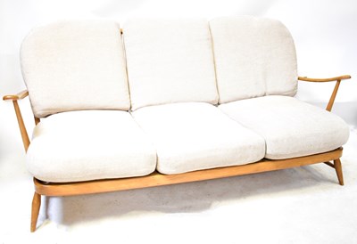 Lot 54 - ERCOL; a model 203 light elm and beech...