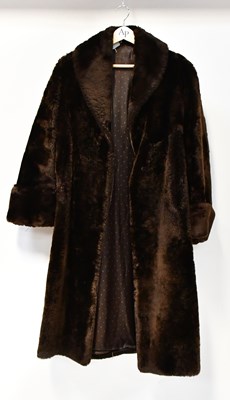 Lot 708 - Two fur coats, comprising a full-length brown...