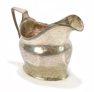 Lot 2402 - A Georgian hallmarked silver helmet shaped...
