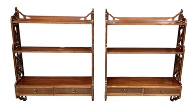 Lot 57 - A pair of reproduction mahogany Chippendale...