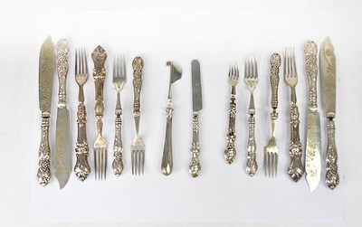 Lot 859 - A quantity of silver-handled fruit knives and...