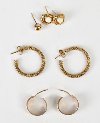 Lot 1104 - Three pairs of 9ct yellow gold earrings,...