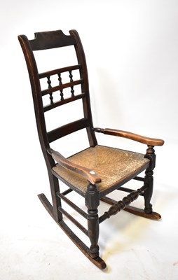 Lot 44 - A 19th century Lancashire spindle-back rush...