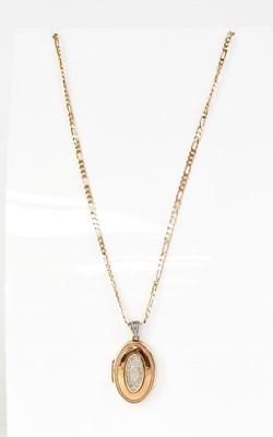Lot 1075 - A 9ct gold locket set with diamonds to the...