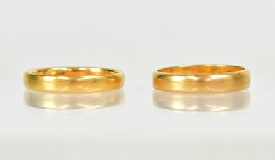 Lot 1010 - Two 22ct yellow gold wedding bands, sizes L...