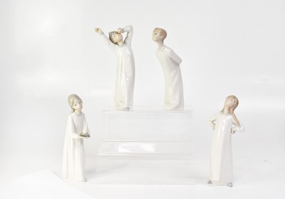 Lot 166 - LLADRÓ; four Lladrό figures of children in...