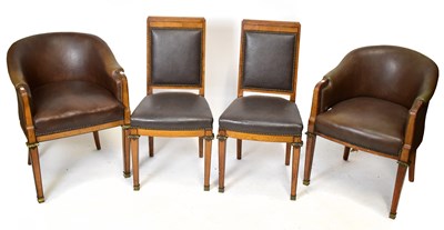 Lot 1574 - A pair of early 20th century Belgian oak framed and leather tub chairs