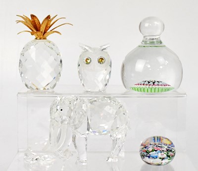 Lot 579 - Two millefiori glass paperweights, together...