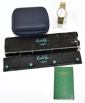 Lot 1726 - LONGINES; a gentleman's quartz wrist watch,...