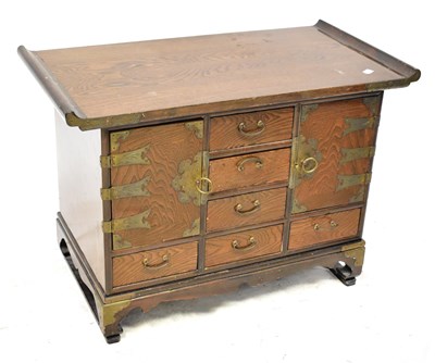 Lot 549 - A Korean elm collector's or apothecary cabinet,...