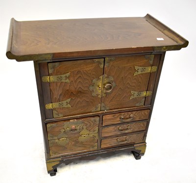 Lot 548 - A Korean elm collectors' or apothecary cabinet,...