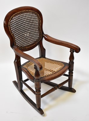 Lot 17 - A 19th century child's balloon-back rocking...