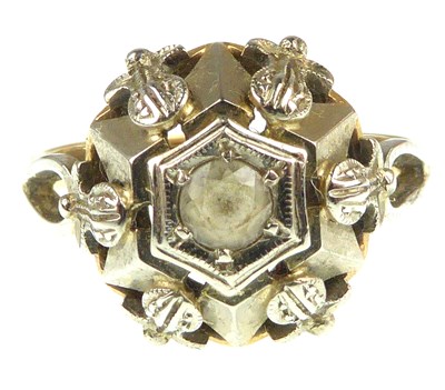 Lot 1007 - An 18ct gold diamond dress ring with central...