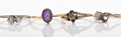 Lot 497 - An 18ct yellow gold amethyst dress ring, size...