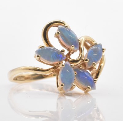 Lot 506 - A 14ct yellow gold five stone opal set ring,...