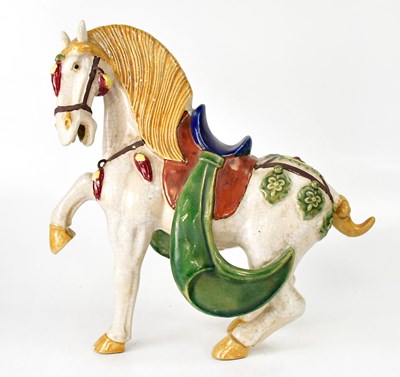 Lot 176 - A Tang-style ceramic horse with crackle glaze...