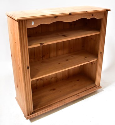 Lot 81 - A modern pine floor standing bookcase of three...