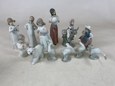 Lot 150 - LLADRO; a quantity of figures, to include...