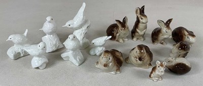 Lot 175 - POOLE POTTERY; white glazed bone china birds...