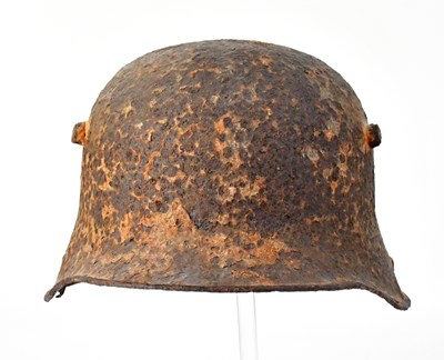 Lot 499 - A WWII German war relic M35 Stahlhelm (steel...
