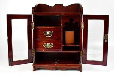 Lot 618 - An early 20th century mahogany smoker's...