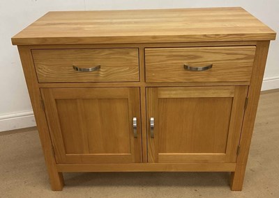 Lot 745 - G PLAN; a side board with two drawers above...