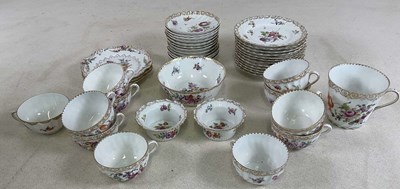 Lot 251 - DRESDEN; a floral decorated part tea service...