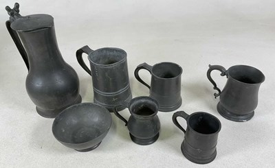 Lot 128 - Seven early pewter items comprising a jug, a...