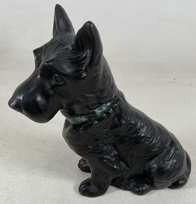 Lot 256 - SYLVAC; a large black Scottie dog figure, with...