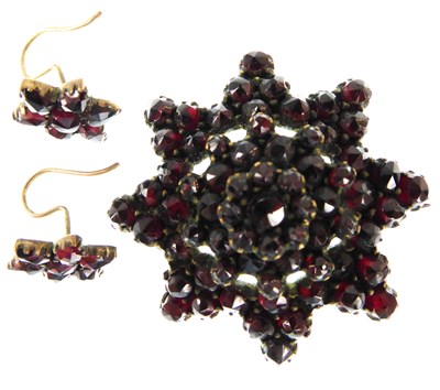 Lot 1146 - A 19th century gilt metal and garnet star...