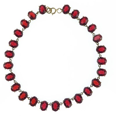 Lot 1163 - A 19th century gilt metal necklace with claw...