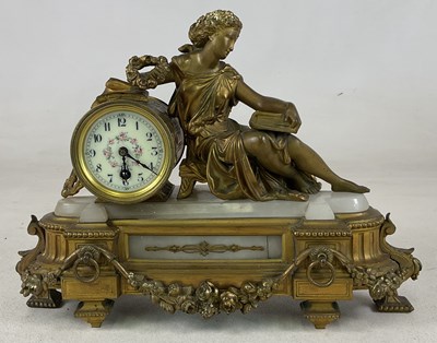 Lot 655 - A gilt and onyx eight day mantel clock with a...
