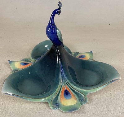 Lot 201 - FRANZ PORCELAIN; a large peacock snack dish,...