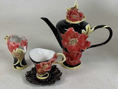 Lot 193 - FRANZ PORCELAIN; a peony tea set, comprising a...